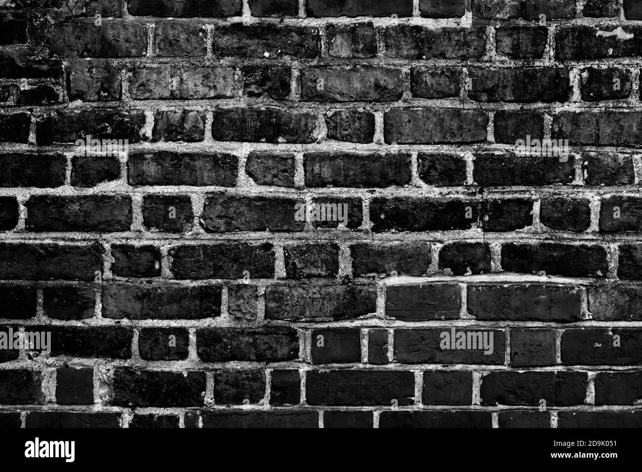 Vieux mur de briques. Arrière-plan de mur en brique de couleur rouge large horizontal. Façade de maison d'époque Banque D'Images