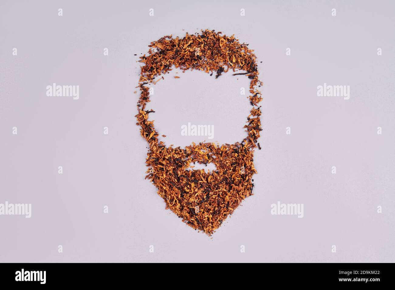 Visage barbu pour hommes fait de feuilles de thé sèches. Banque D'Images