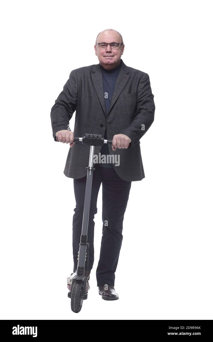 pleine croissance . Homme d'affaires mature avec un scooter électrique Banque D'Images