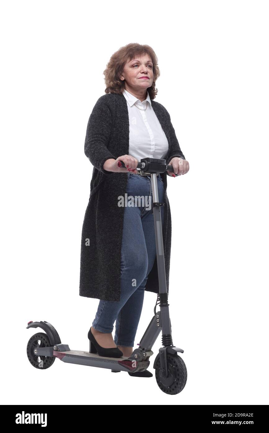 en pleine croissance. femme adulte confiante avec un scooter électrique Banque D'Images