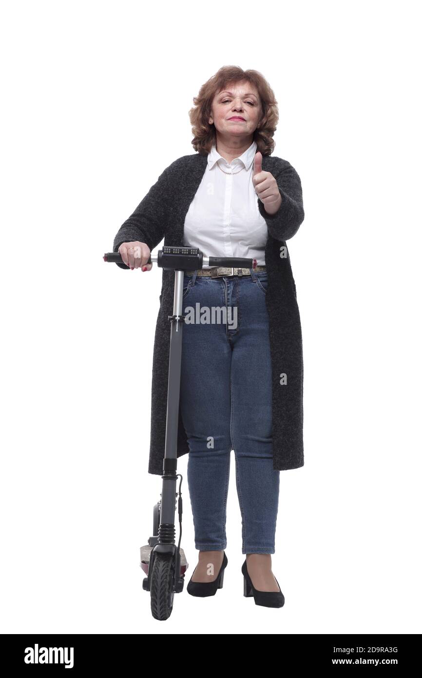 en pleine croissance. femme adulte moderne avec un scooter électrique Banque D'Images