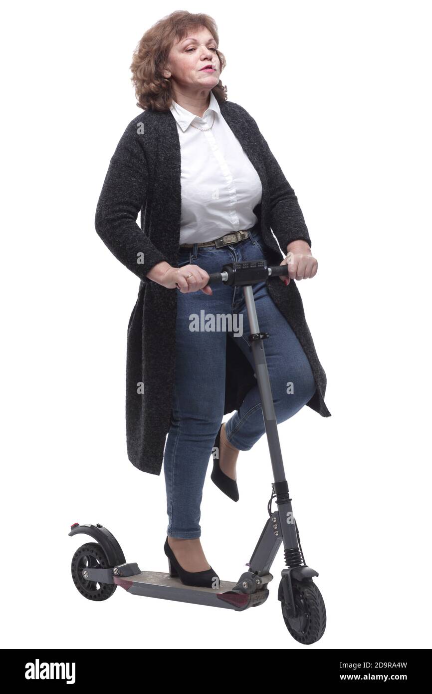 en pleine croissance. femme adulte confiante avec un scooter électrique Banque D'Images