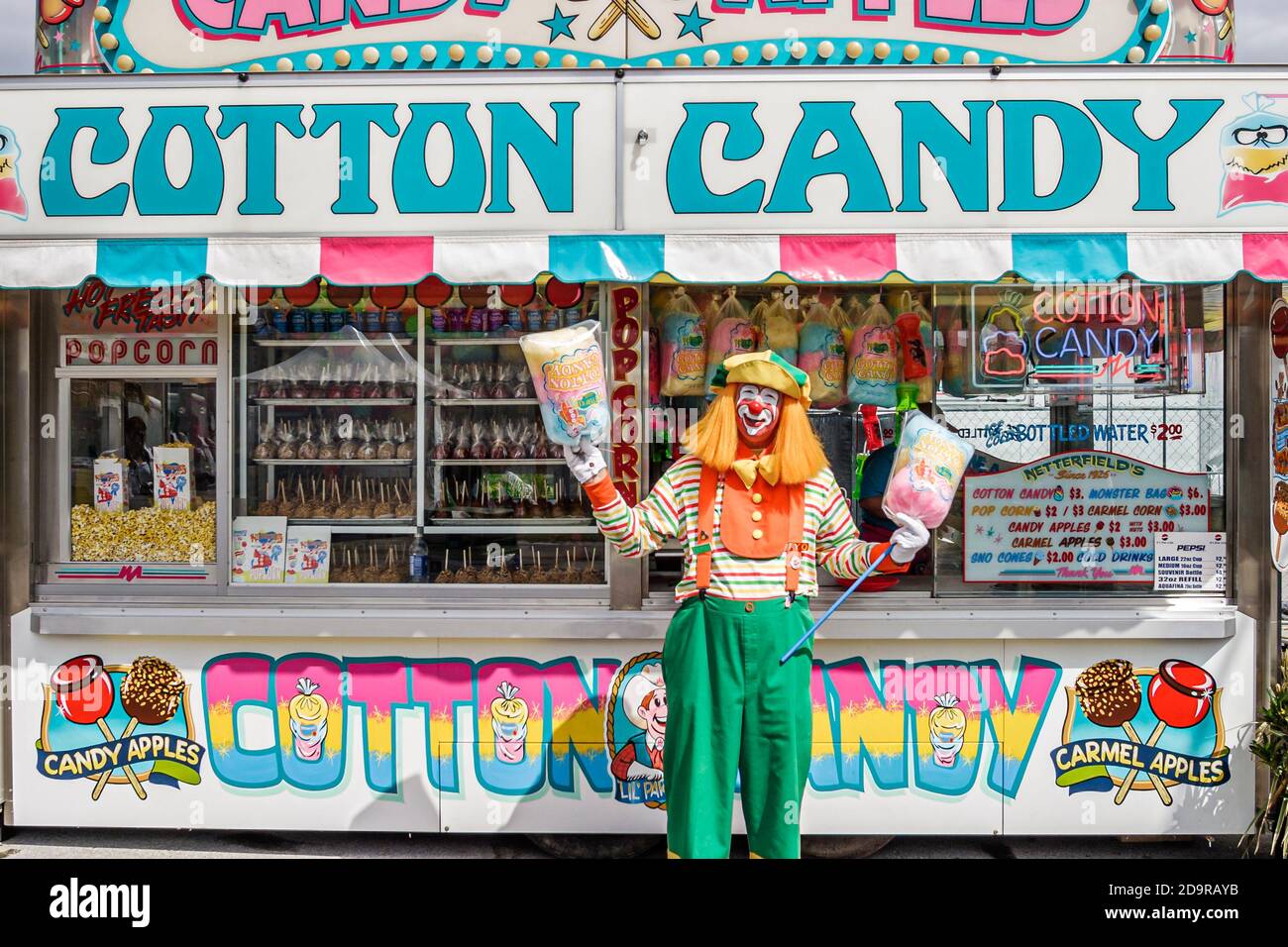 Miami Florida, foire et exposition du comté de Dade, clown de bonbons en coton à mi-parcours annuel de carnaval, vendeur vendant stand, Banque D'Images