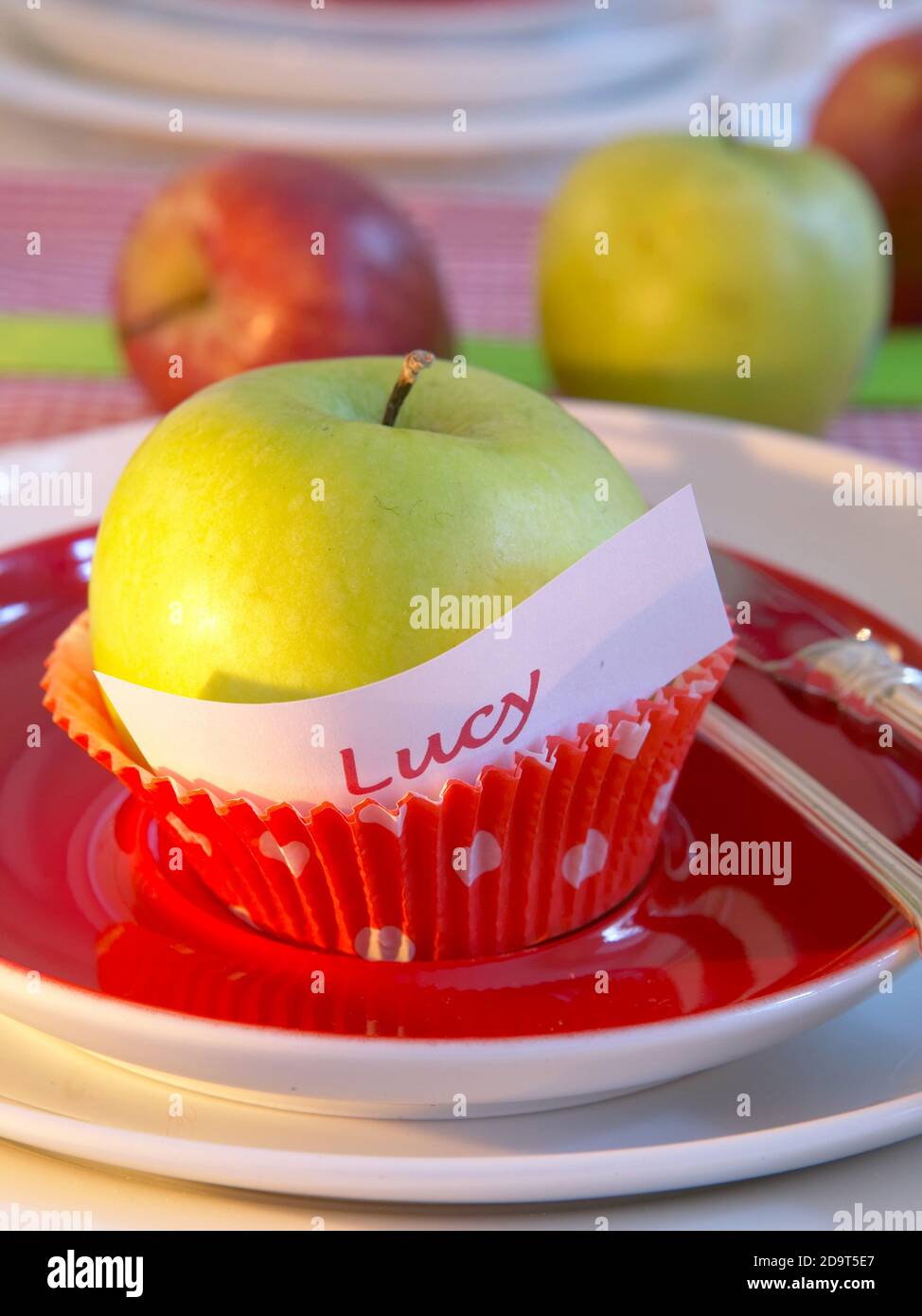 Pomme et nom dans une tasse de muffin USAGE au Royaume-Uni UNIQUEMENT/E-MAIL POUR EFFACER LES AUTRES DROITS Banque D'Images