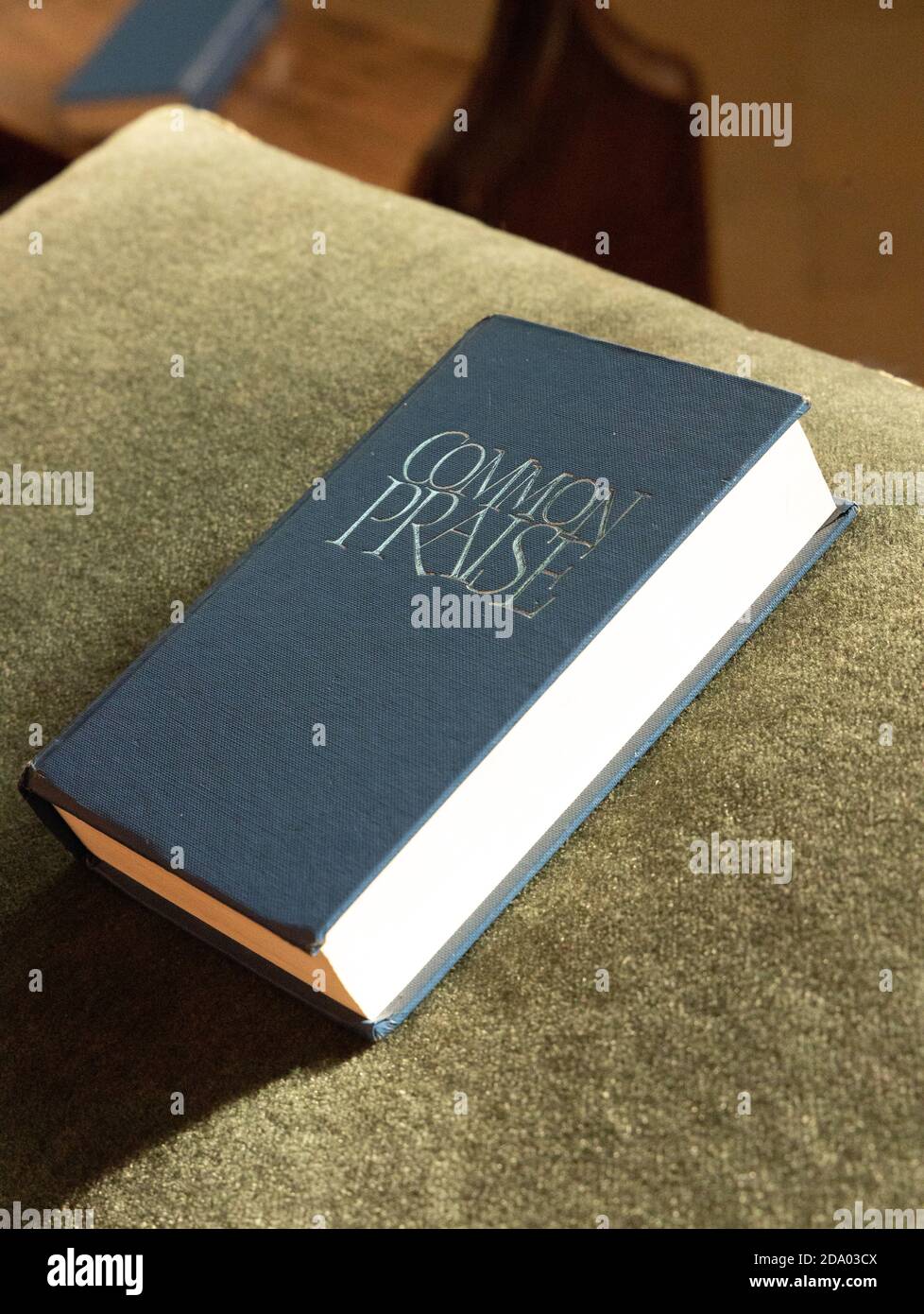 Livre d'hymnes anglican Common Clouange Queens College Chapel, Cambridge, Banque D'Images