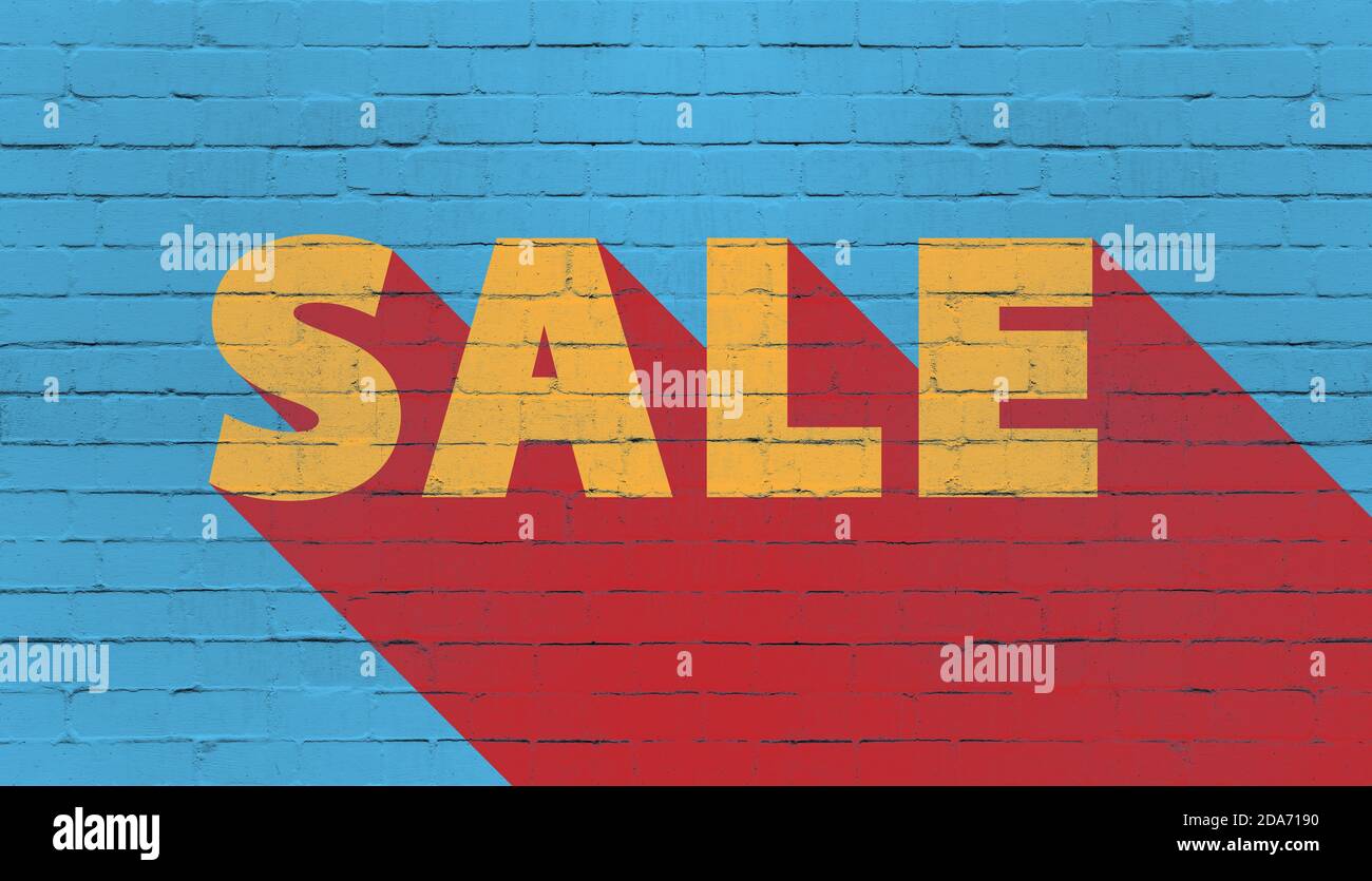 Vente de mot peint sur mur de pierre bleue, concept de marketing d'affaires Banque D'Images