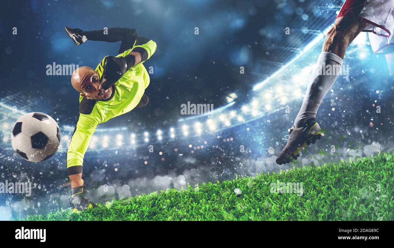 Gardien de but contre l'attaquant essayant de marquer un but Banque D'Images