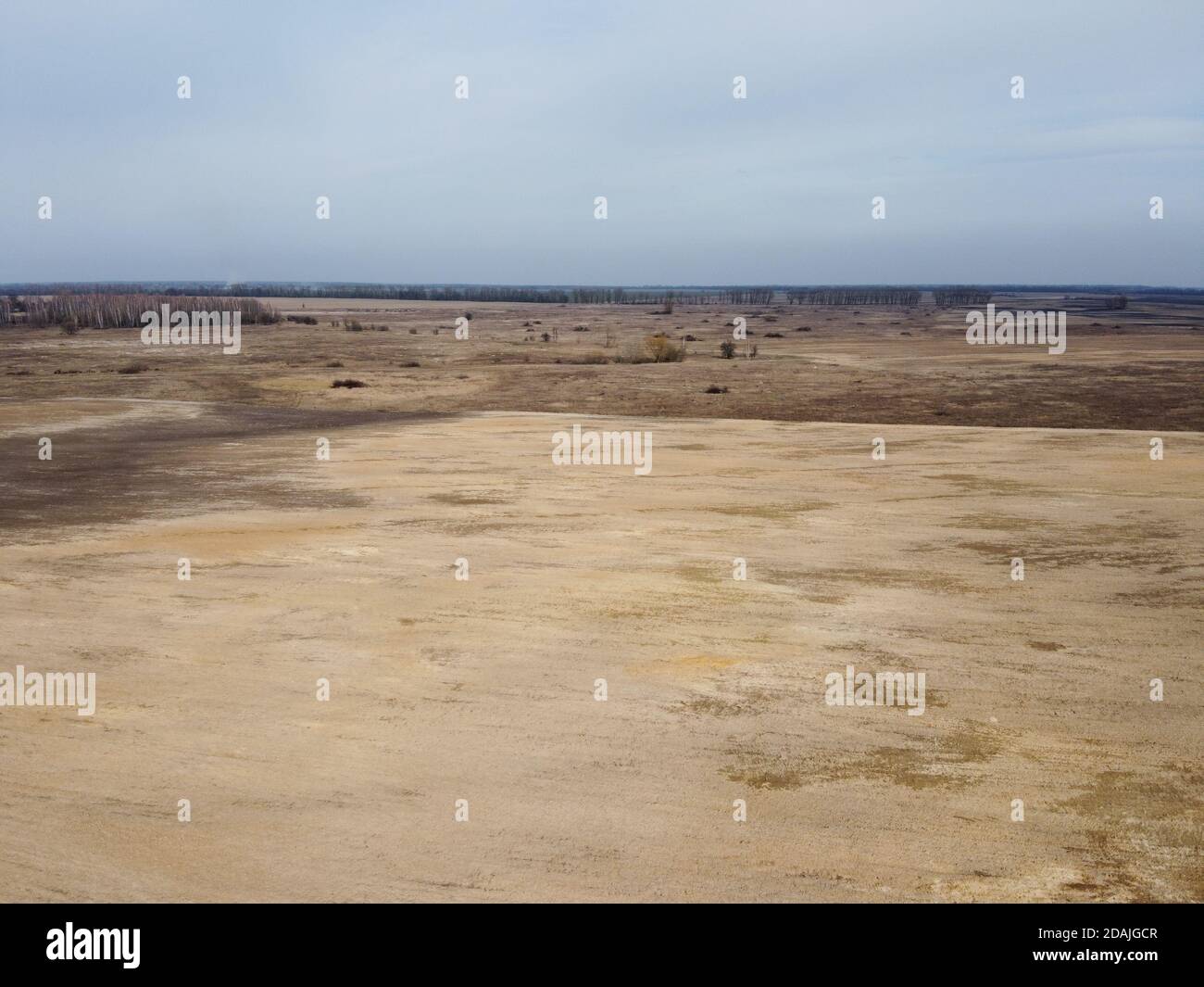 Terres agricoles, vue aérienne. Paysage. Les champs arables au printemps. Banque D'Images