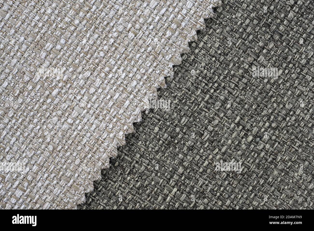 Tissus pour meubles rembourrés. Contexte de l'industrie textile. Tissus d'ameublement gris, vue de dessus. tissus d'ameublement de canapé aux lignes diagonales. Banque D'Images