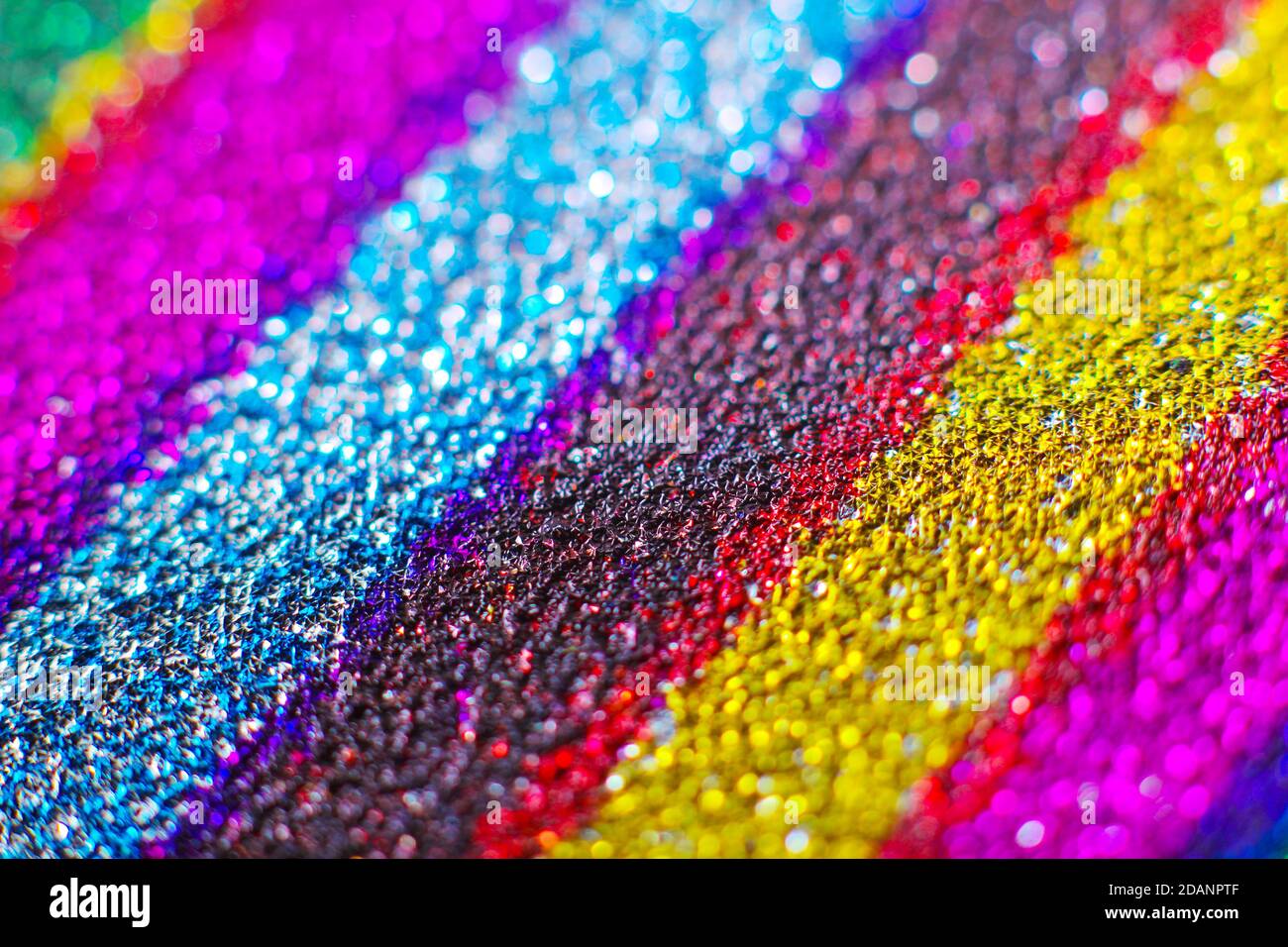 Arrière-plan scintillant aux couleurs vives et arc-en-ciel Banque D'Images