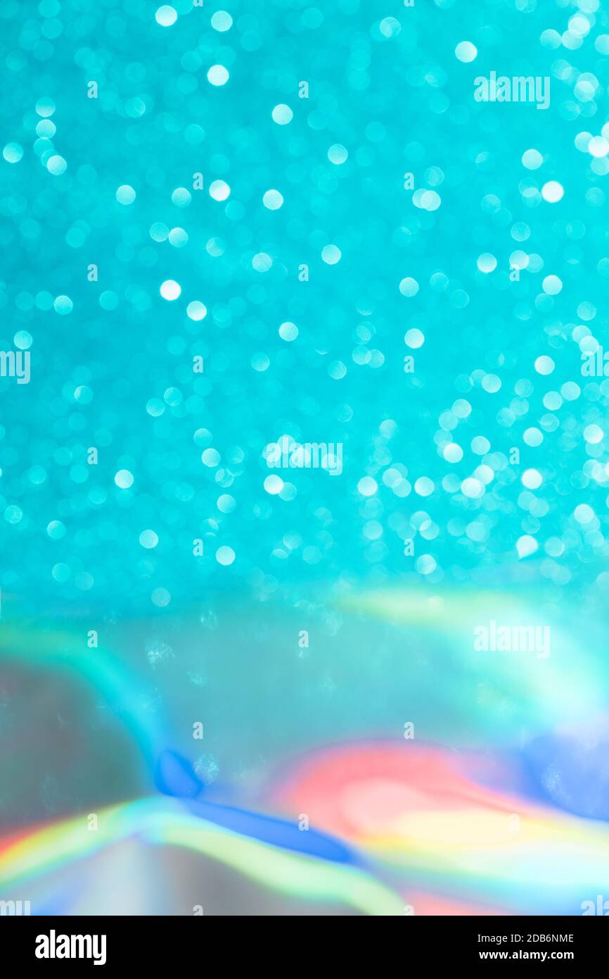 Abstrait mixte holographique bleu ai aqua flou scintillant fond brillant. Film arc-en-ciel au néon liquide style licorne. Style bokeh brillant. Festiv Banque D'Images