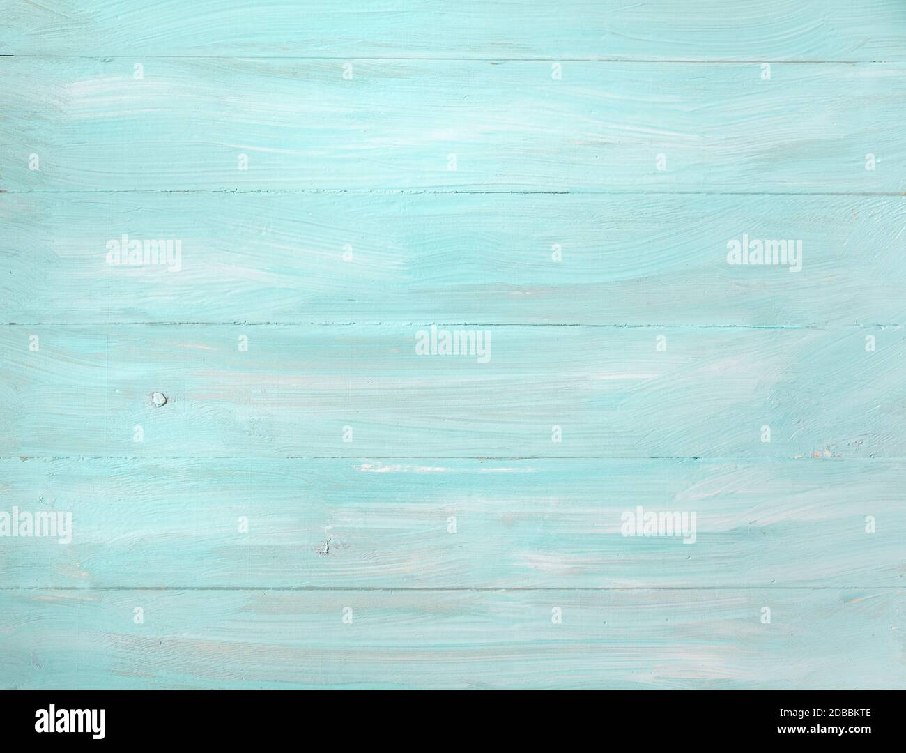 Fond rustique en vieux planche aux couleurs turquoise, menthe et beige avec rayures de texture et peinture crépiteuse ancienne. Vue de dessus. Espace de copie. Gabarit en bois Banque D'Images
