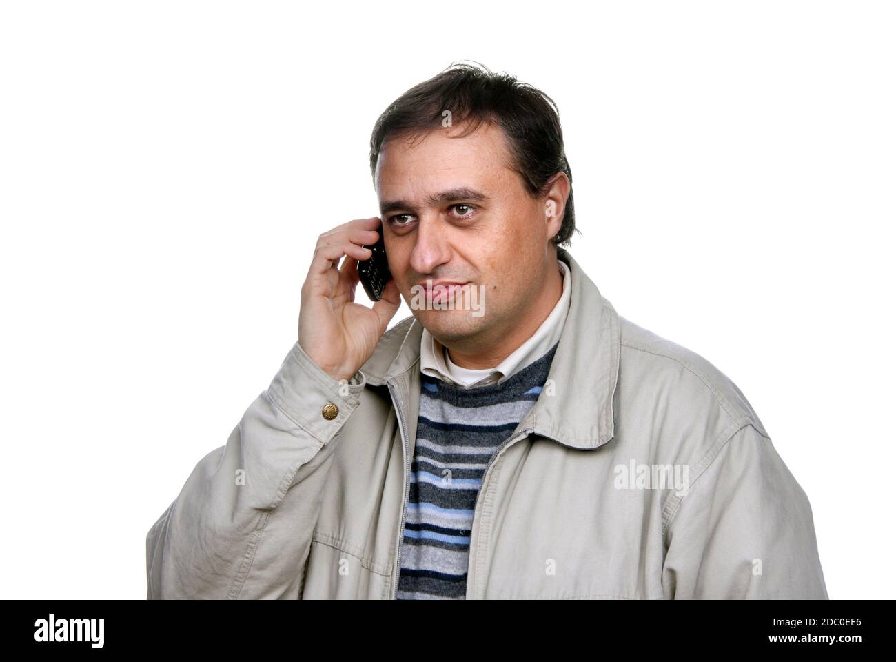 homme sur le téléphone sur un fond blanc Banque D'Images