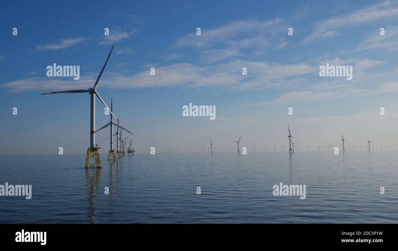 Éoliennes offshore en ligne dans un parc éolien offshore En Allemagne Banque D'Images Éoliennes offshore en ligne dans un parc éolien offshore En Allemagne Banque D'Images