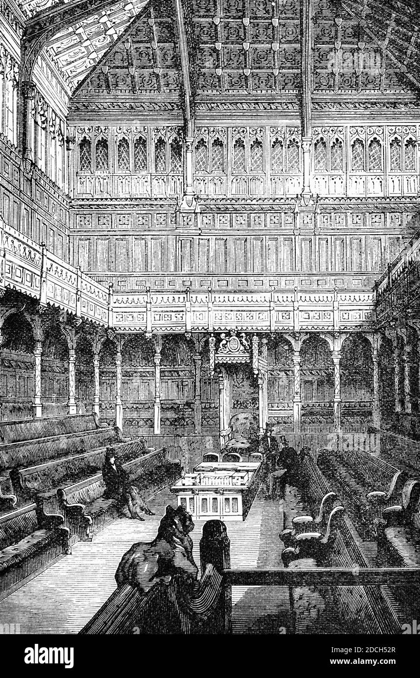 Vue du XIXe siècle de la Chambre des communes dans le Palais de Westminster, sur la rive nord de la Tamise, dans la ville de Westminster, dans le centre de Londres, en Angleterre. Il a été conçu par Augustus Pugin dans un style néo-gothique et achevé en 1859. Banque D'Images