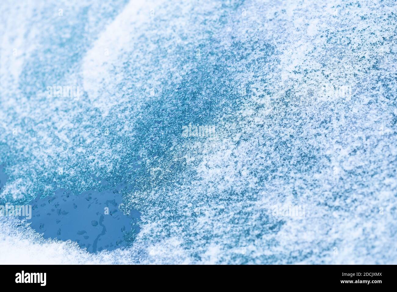 Glace sur un verre de voiture Banque D'Images