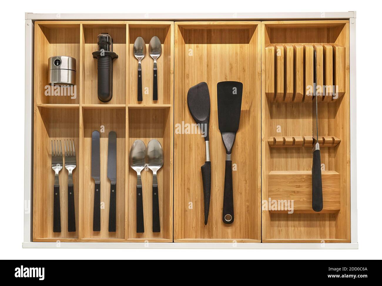 Des outils de cuisine minimaliste sont placés dans un tiroir Banque D'Images
