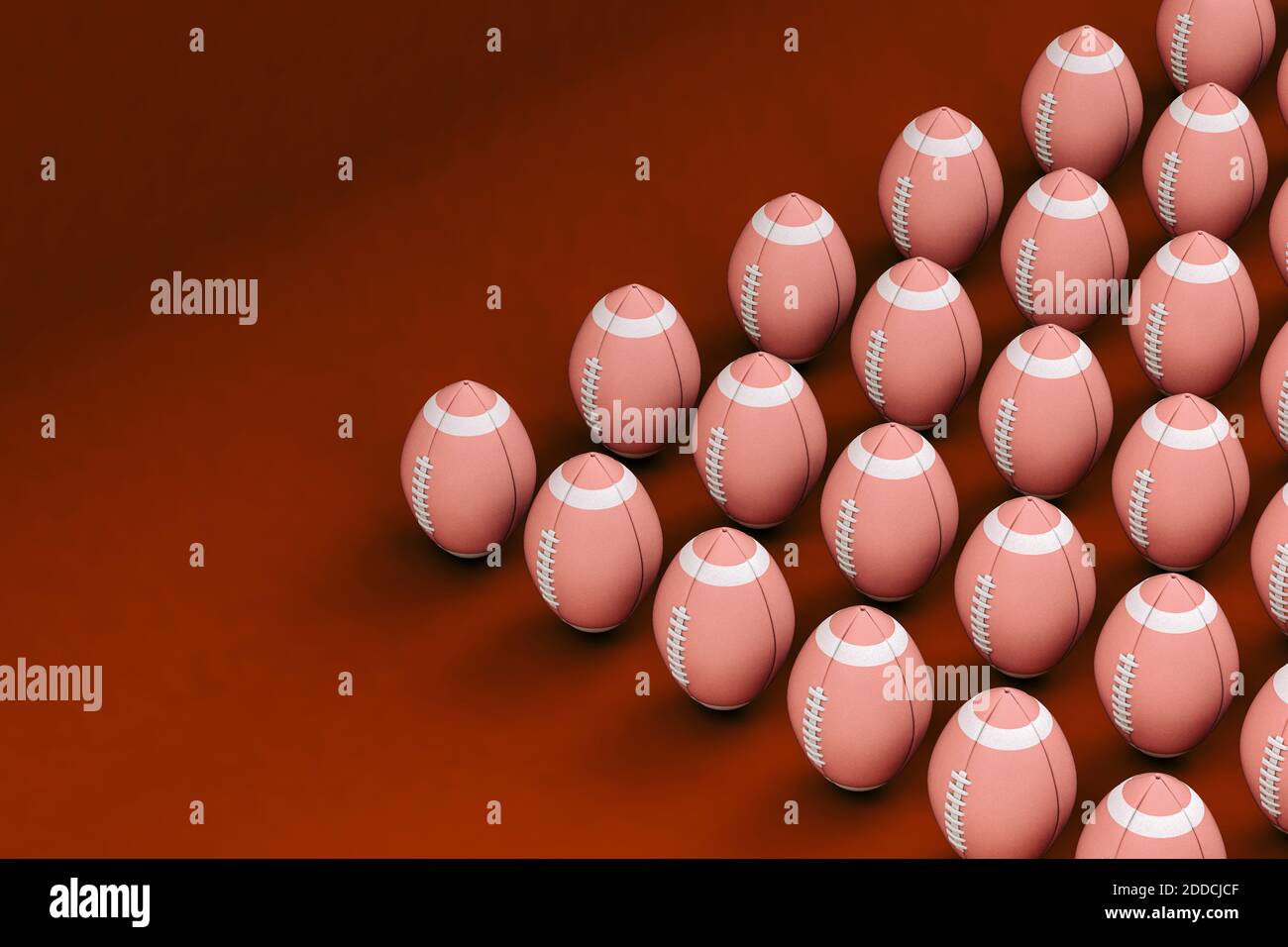 Ballons de rugby sur fond rouge Banque D'Images