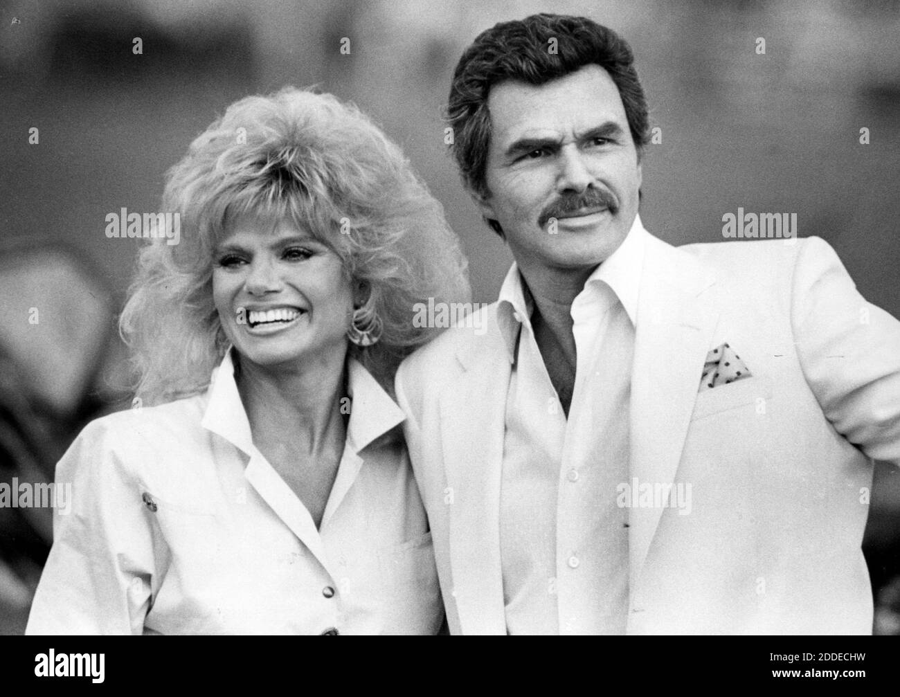 PAS DE FILM, PAS DE VIDÉO, PAS de TV, PAS DE DOCUMENTAIRE - photo de fichier - Burt Reynolds et Loni Anderson à Royal Palm Polo à Boca Raton, Floride, le 15 1987 mars. Reynolds et Anderson ont pris l'avion en hélicoptère avant un match de polo pour recevoir un prix. Burt Reynolds, le film Heartthrob des années 1970 et le candidat à l'Oscar, est décédé à l'âge de 82 ans. Il serait décédé dans un hôpital de Floride d'une crise cardiaque avec sa famille à ses côtés. Photo d'Anne Ryan/Sun Sentinel/TNS/ABACAPRESS.COM Banque D'Images PAS DE FILM, PAS DE VIDÉO, PAS de TV, PAS DE DOCUMENTAIRE - photo de fichier - Burt Reynolds et Loni Anderson à Royal Palm Polo à Boca Raton, Floride, le 15 1987 mars. Reynolds et Anderson ont pris l'avion en hélicoptère avant un match de polo pour recevoir un prix. Burt Reynolds, le film Heartthrob des années 1970 et le candidat à l'Oscar, est décédé à l'âge de 82 ans. Il serait décédé dans un hôpital de Floride d'une crise cardiaque avec sa famille à ses côtés. Photo d'Anne Ryan/Sun Sentinel/TNS/ABACAPRESS.COM Banque D'Images