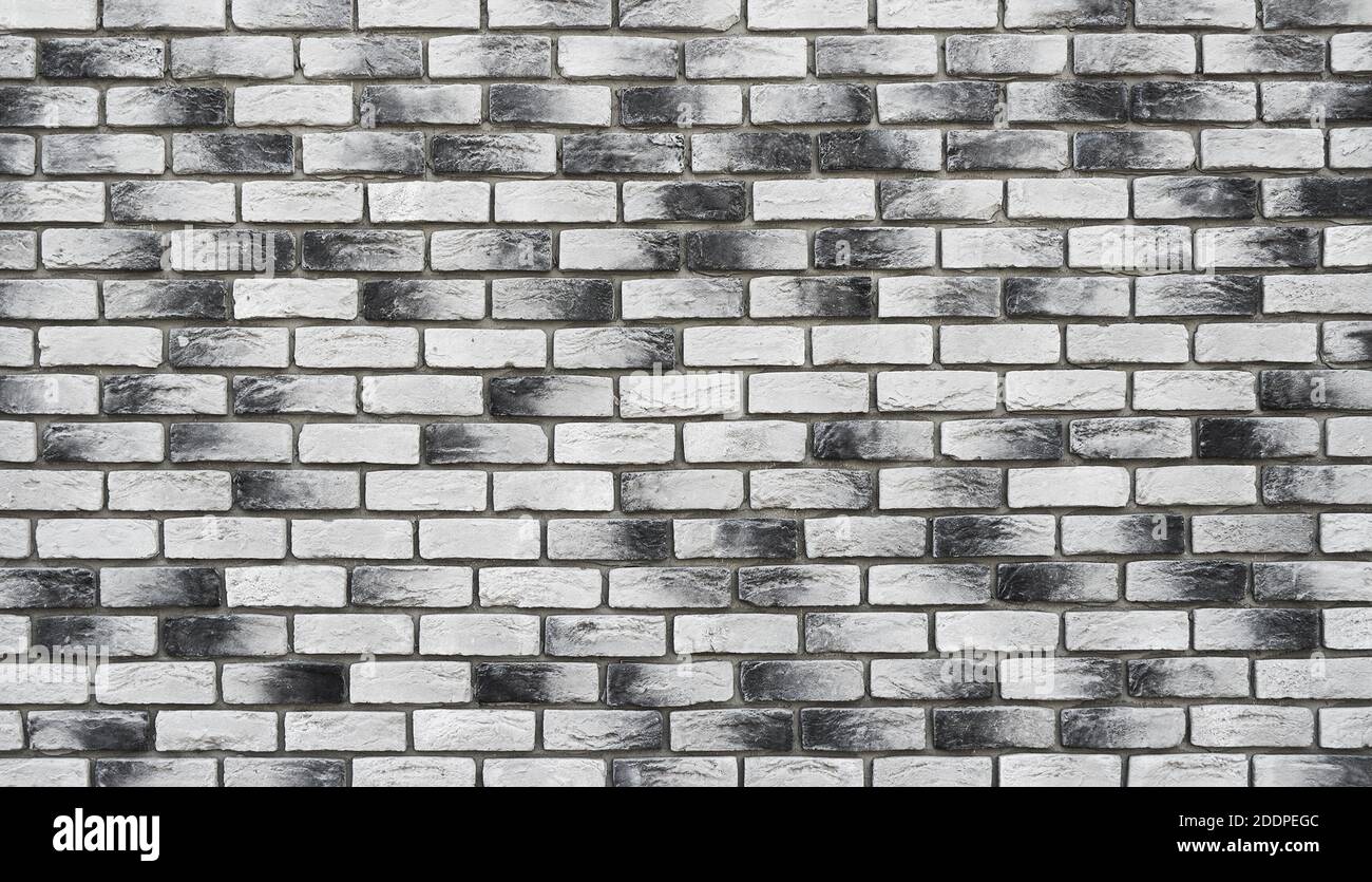 Photo de qualité d'un mur de briques fait à la main, loft. Mur en brique simple et haut de gamme. Arrière-plan ou texture. Banque D'Images