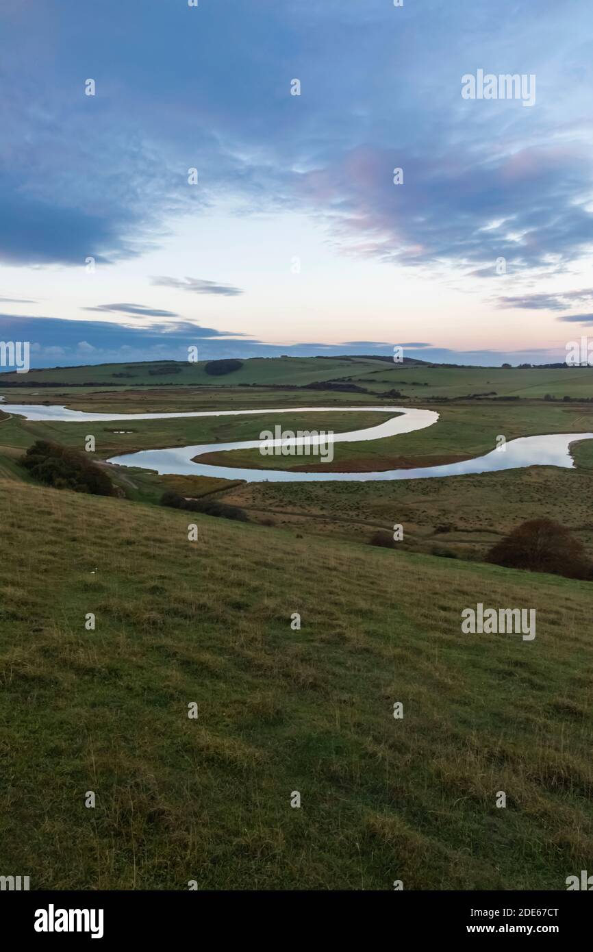 Angleterre, East Sussex, Eastbourne, South Downs National Park, Birling Gap, la rivière Cuckmere au coucher du soleil Banque D'Images
