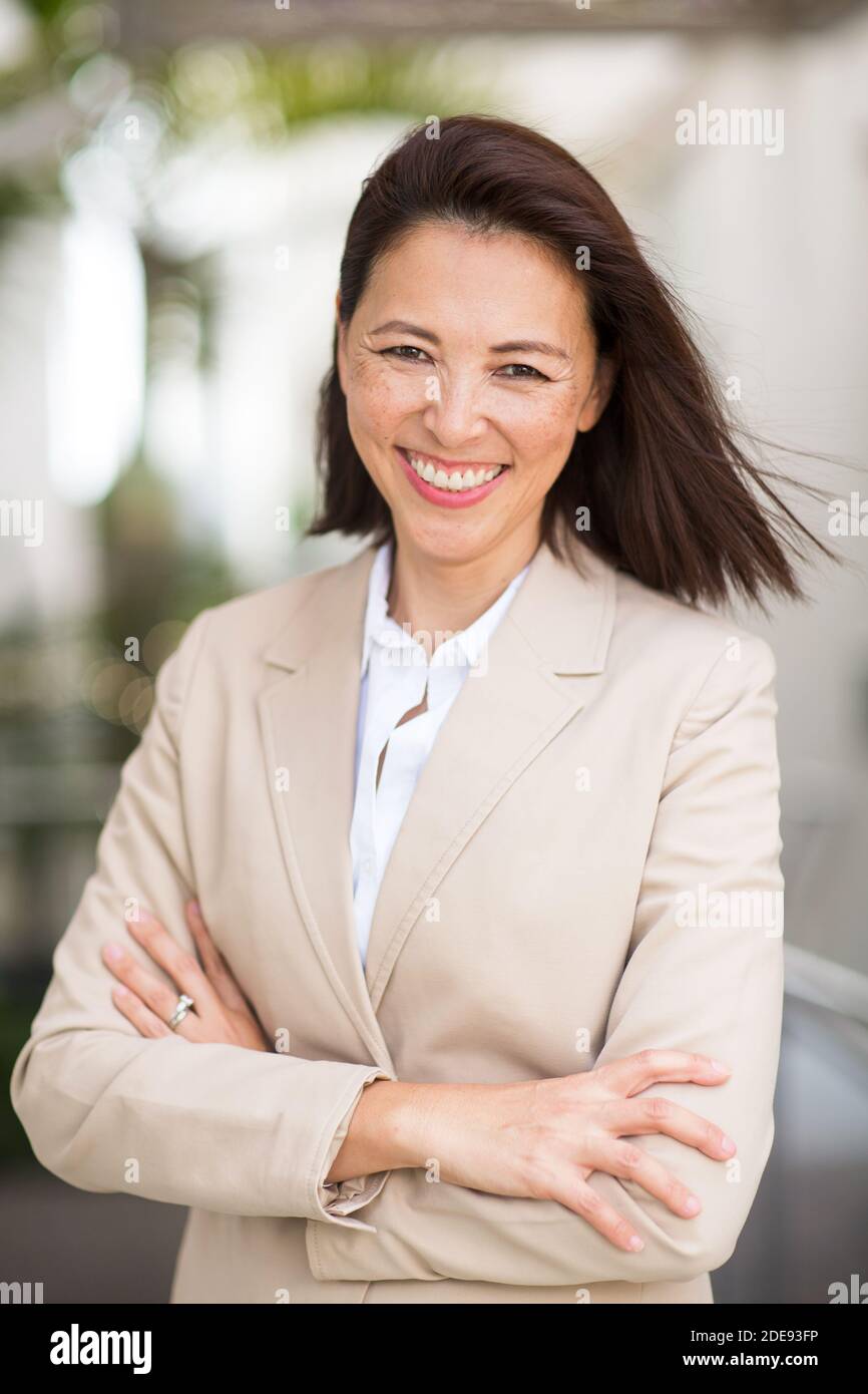 Portrait d'un Asian businesswoman smiling. Banque D'Images