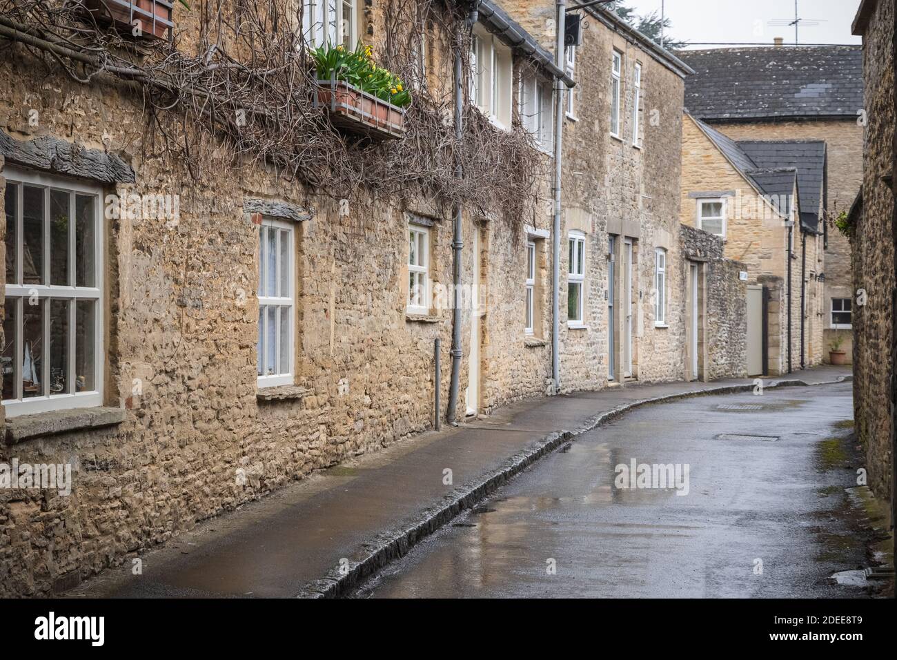 Backstreet dans le village de Fairford, Gloucestershire, Angleterre Banque D'Images