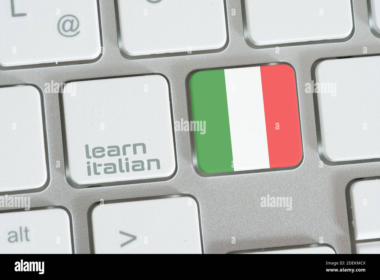 Ordinateur et clé pour apprendre l'italien Banque D'Images