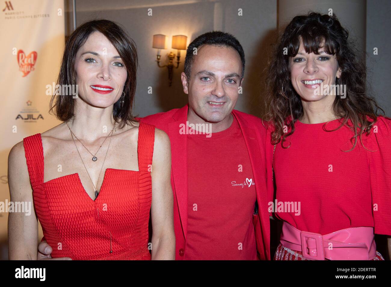 Laetitia Fourcade, Laurent Amar et Magali Ripoll assistent à la défile rouge 2019 à l'hôtel Marriott champs-Elysées à Paris, France, le 15 novembre 2019. Photo d'Aurore Marechal/ABACAPRESS.COM Banque D'Images