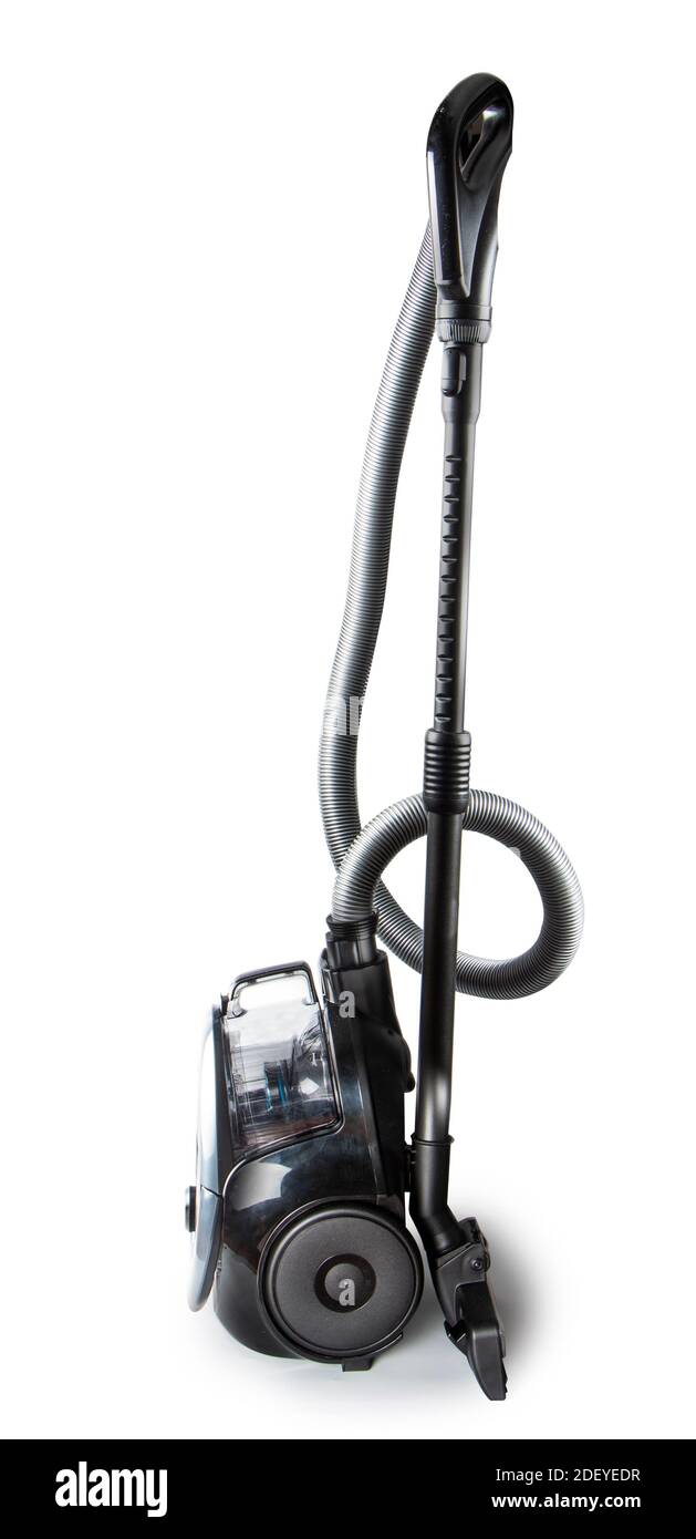 L'aspirateur noir sur fond blanc se tient verticalement. Gros plan Banque D'Images