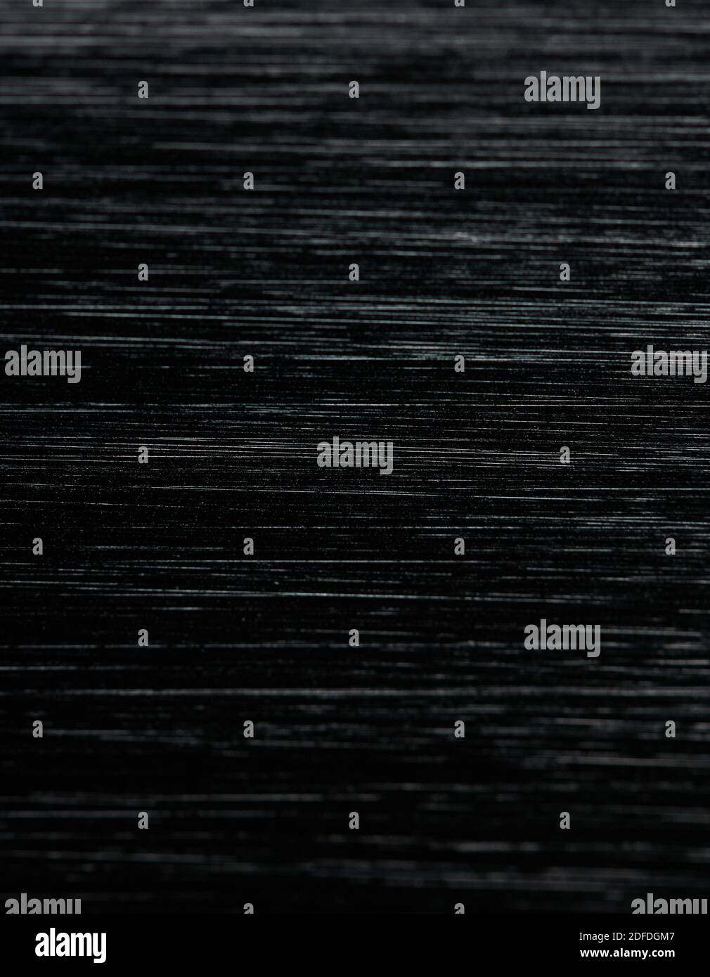 Macro d'arrière-plan en acier brossé noir, vue rapprochée avec sélection mise au point Banque D'Images