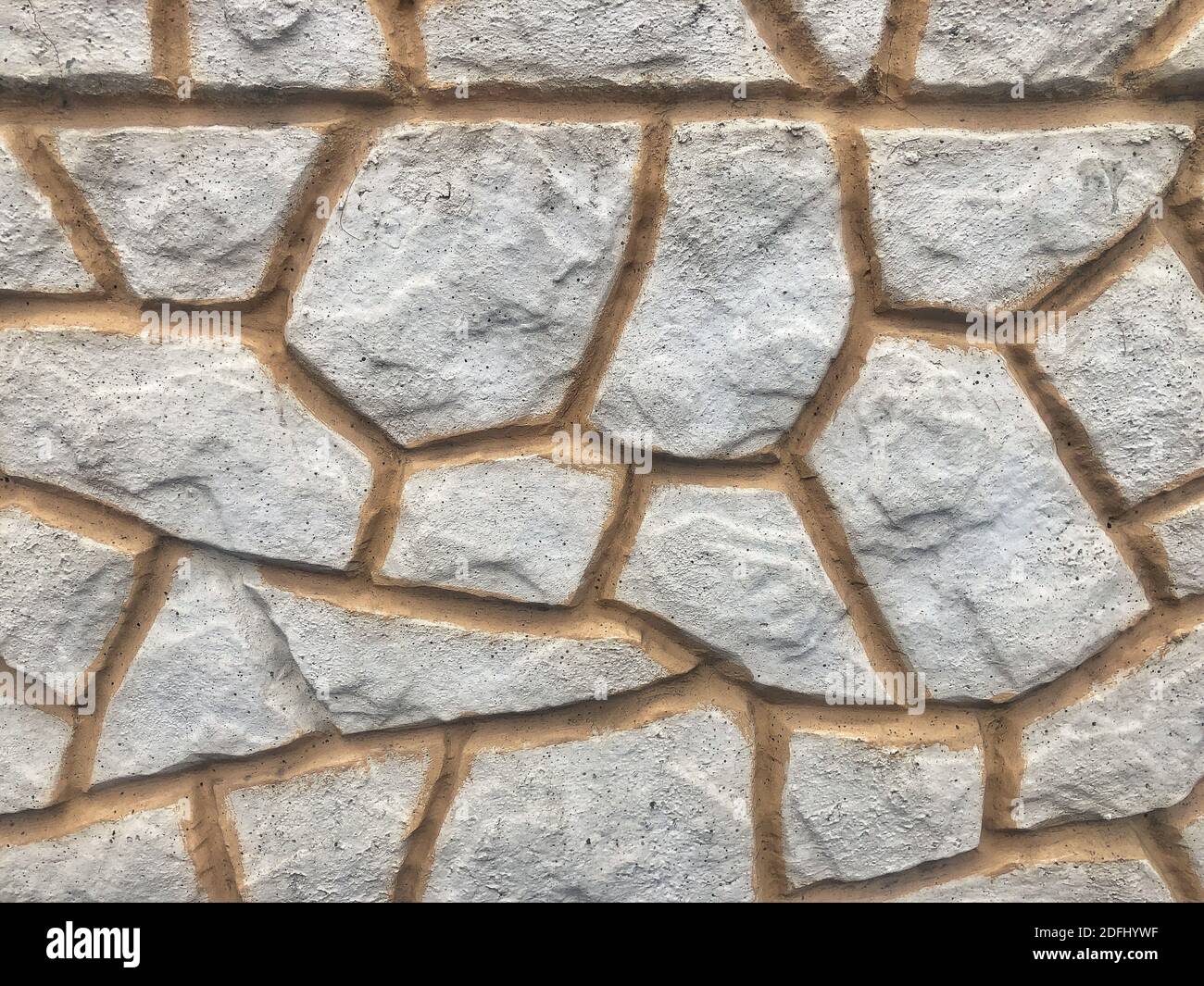 Fond nature de la texture décorative de mur en pierre de granit gris. Belle texture en béton Banque D'Images