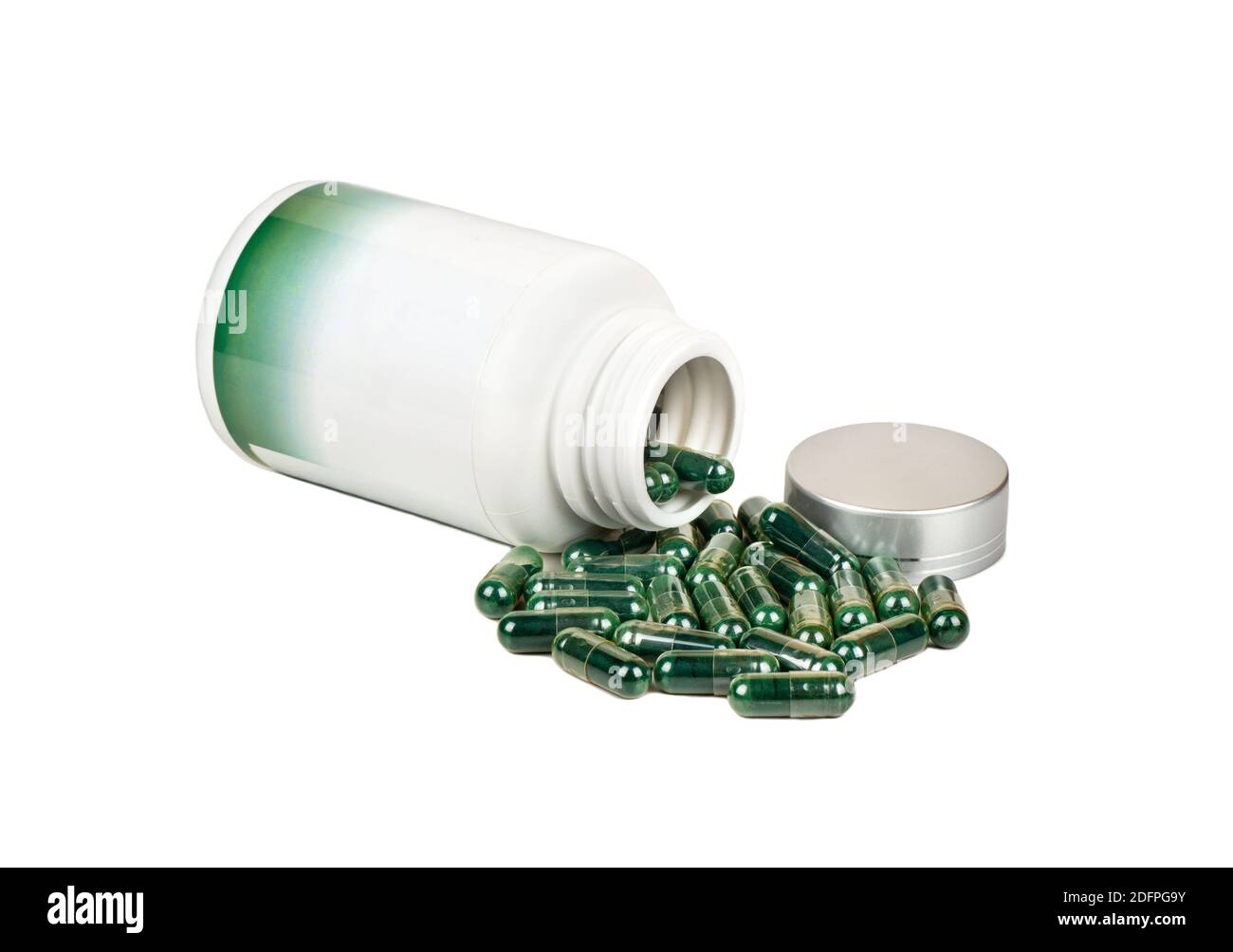 Capsules vertes avec un pot en plastique sur fond blanc Banque D'Images