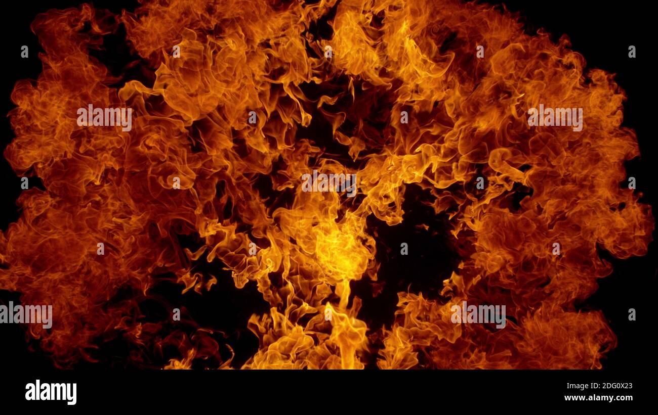 Flammes de feu arrière-plan abstrait, isolé sur noir Banque D'Images