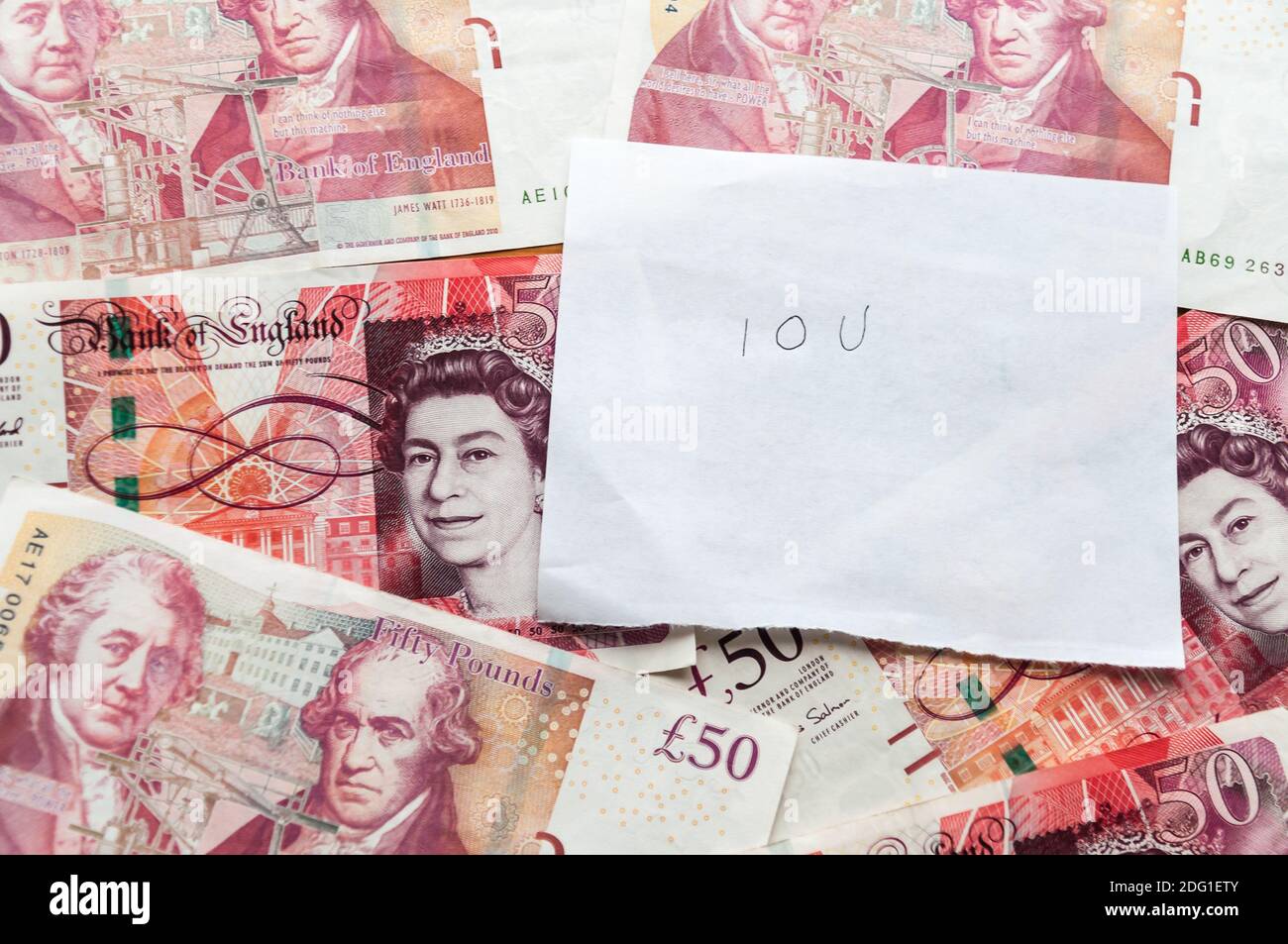 Je vous dois en plus des billets britanniques Banque D'Images