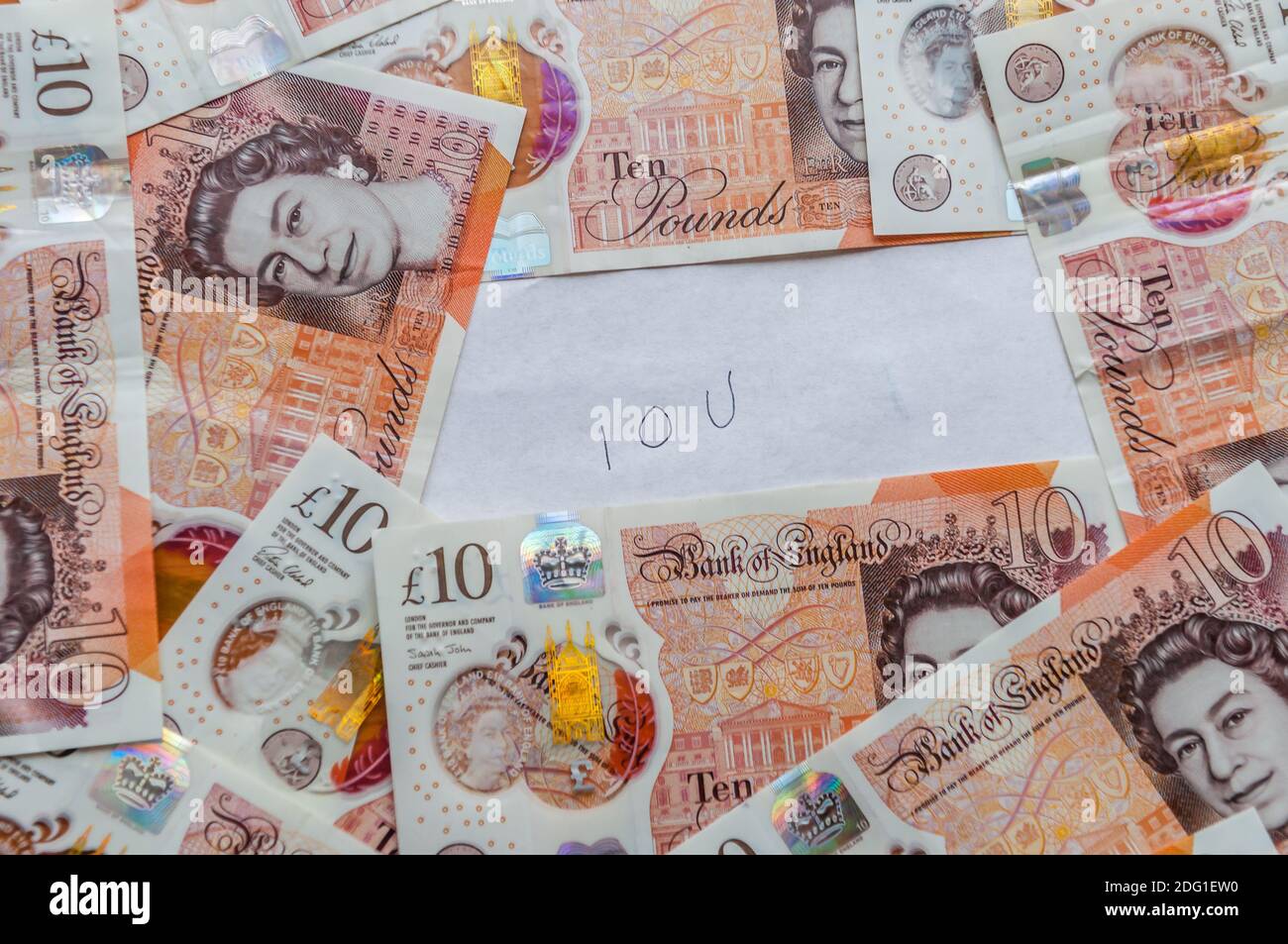Je vous dois en plus des billets britanniques Banque D'Images