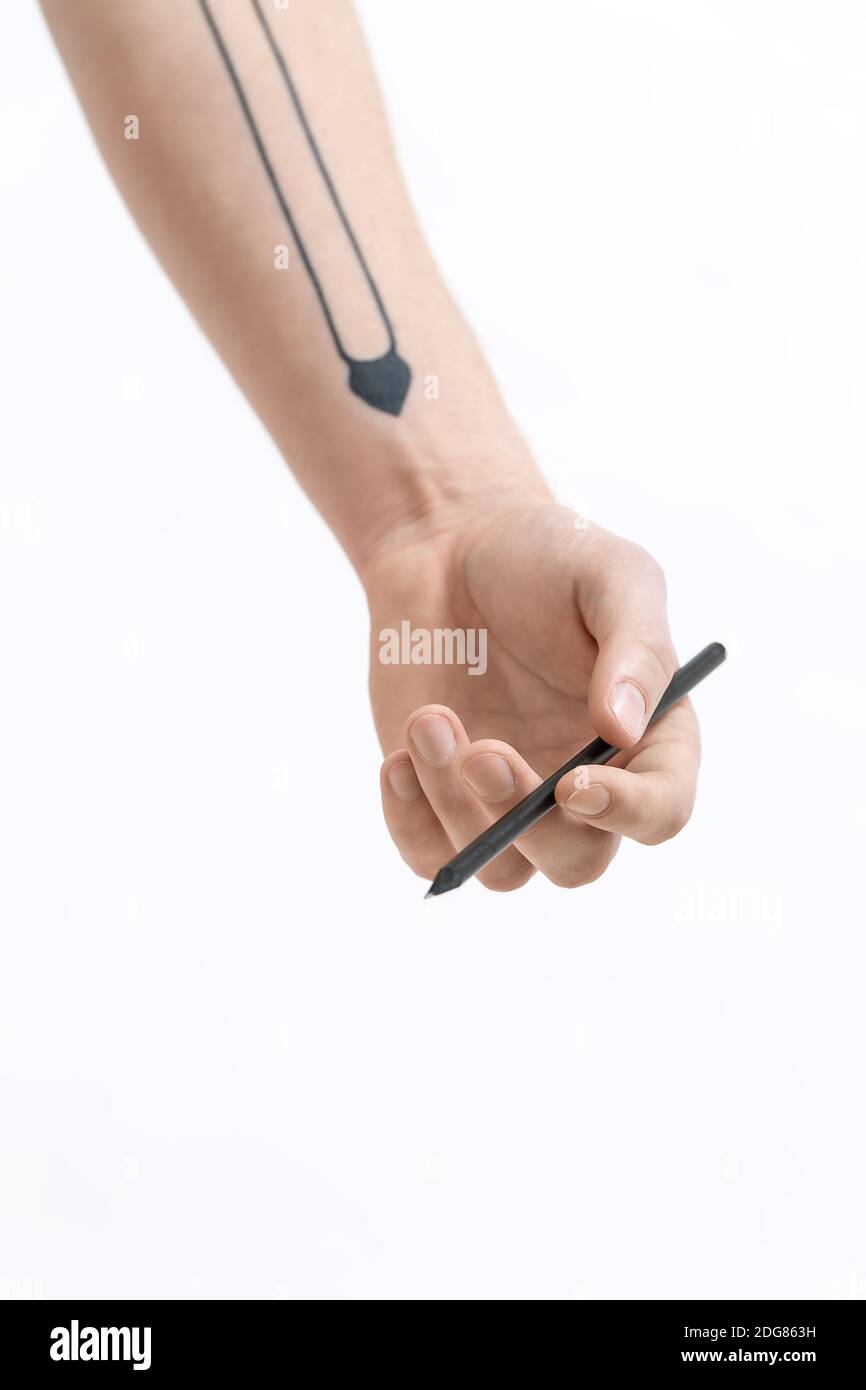 La main avec un crayon noir Banque D'Images