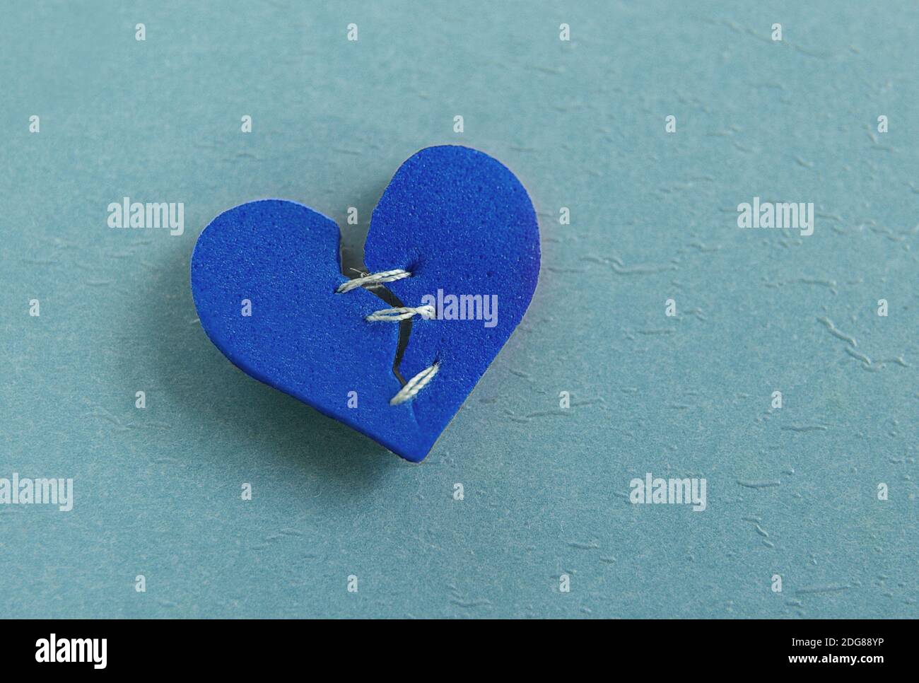 Coeur bleu à mended Banque D'Images