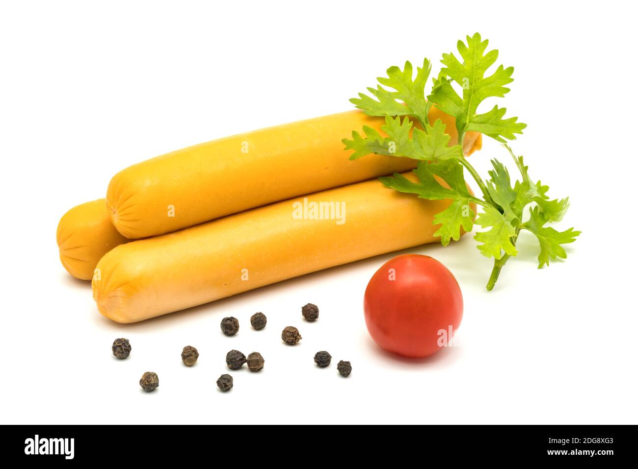Saucisses, tomates, coriandre et poivrons noirs Banque D'Images