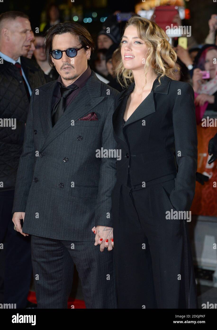 Johnny Depp et Amber entendirent arriver à la première britannique de Mortdecai, Empire Cinema, Leicester Square, Londres Banque D'Images