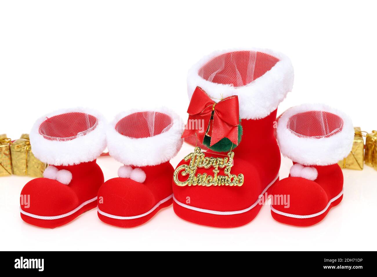 Bottes Red Santa avec espace de copie isolé sur fond blanc Banque D'Images
