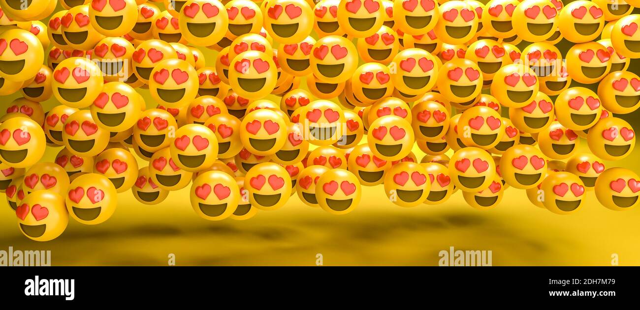 rendu 3d d'un grand groupe de smileys emoji avec des coeurs rouges comme yeux. Coeur yeux - coeur visage. Concept d'amour. Taille de la bannière Web. Banque D'Images