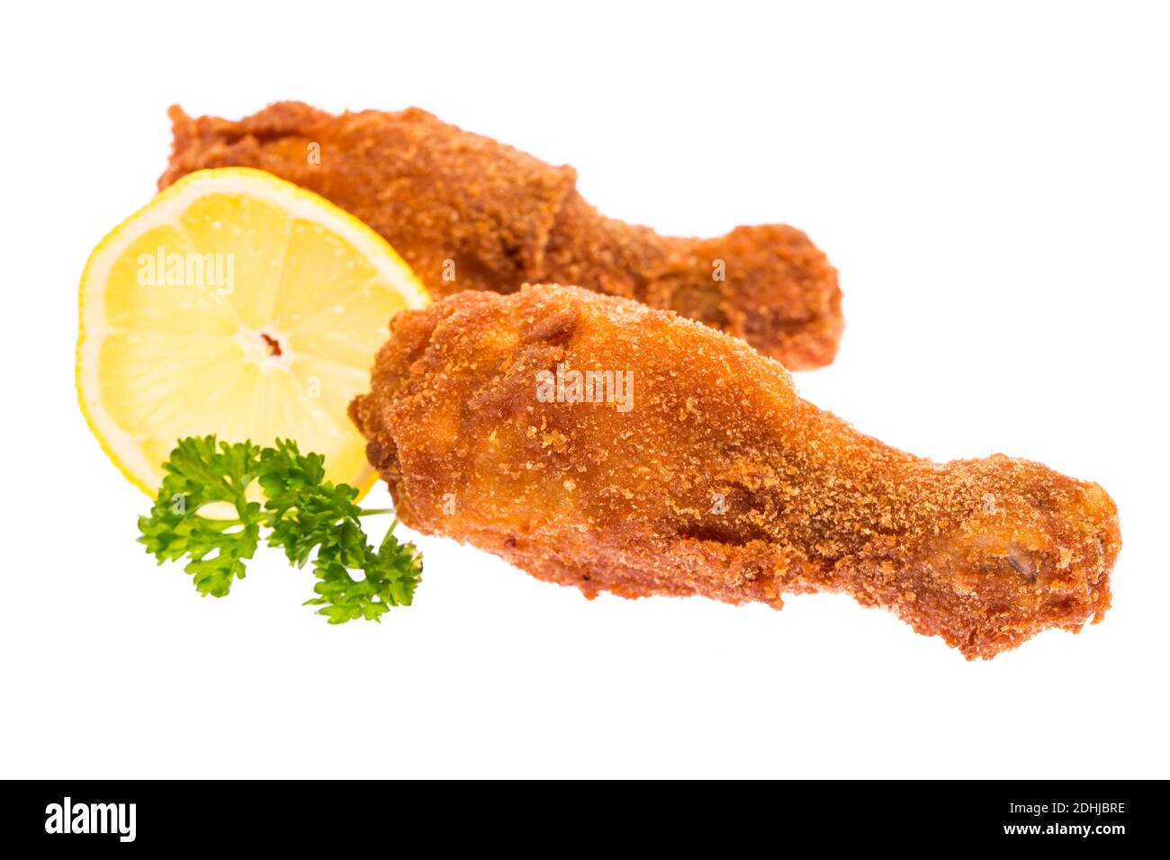 Deux porte-nuques de poulet avec persil et citron Banque D'Images
