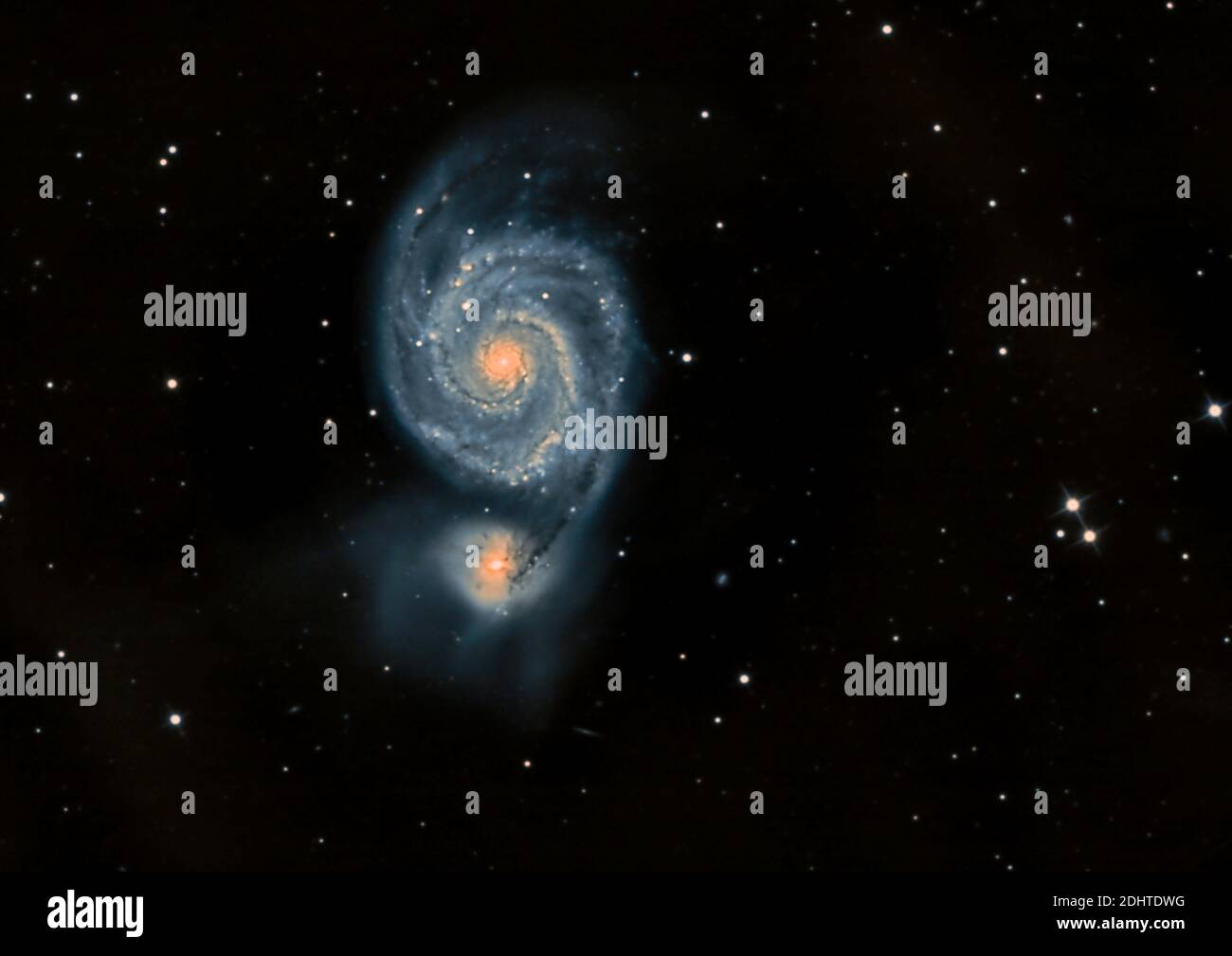 La galaxie à la piscine (Messier 51A) et la galaxie interagissant NGC5195 à Canes Venatici. Banque D'Images