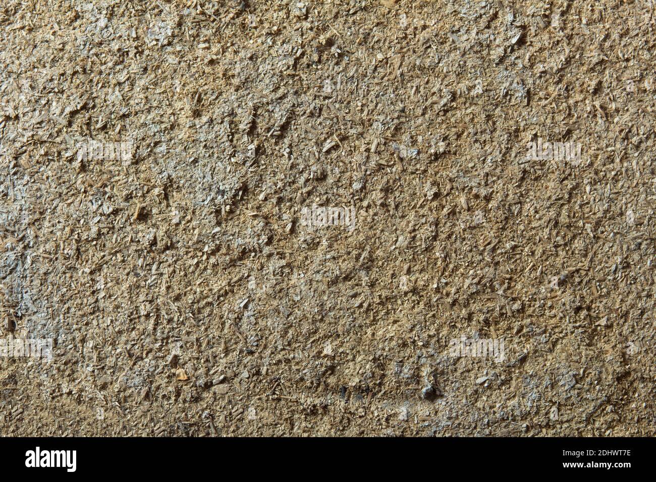 Une texture de panneau de particules sale et ancienne comme arrière-plan. Bois pourri. Banque D'Images