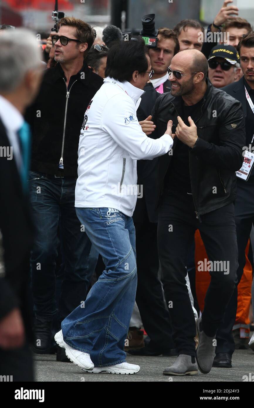 Brad Pitt, Jason Statham et Jackie Chan au début de la 84e course d