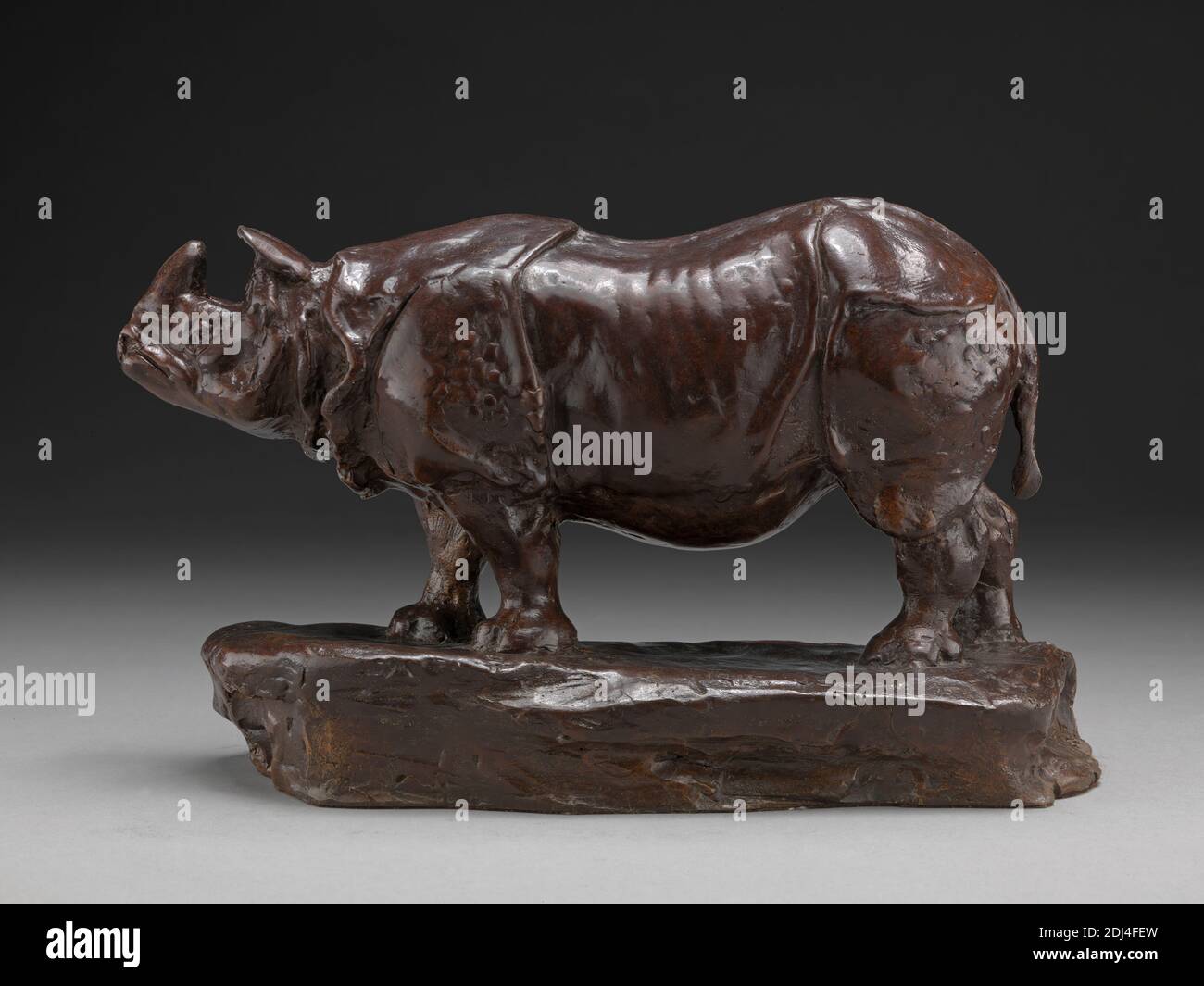 Indian Rhinoceros, John R. Skeaping, 1901–1980, British, Cast 1990 (modèle original 1915), Bronze, total: 4 1/2 x 10 pouces (11.4 x 25.4 cm), art animal, Indien, rhinocéros Banque D'Images