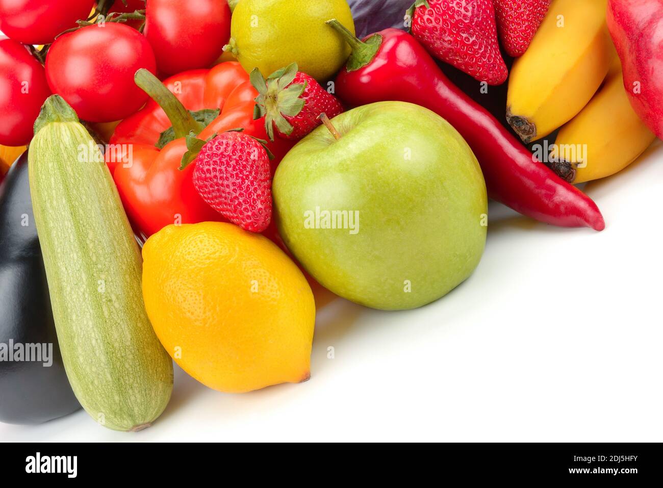 Fruits et légumes isolés sur fond blanc. Banque D'Images