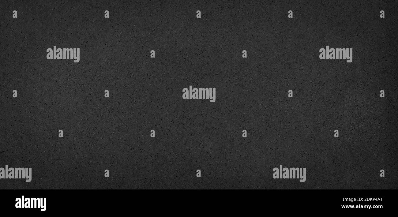 Arrière-plan abstrait - caoutchouc mousse, fond noir non uniforme pour le design. Banque D'Images