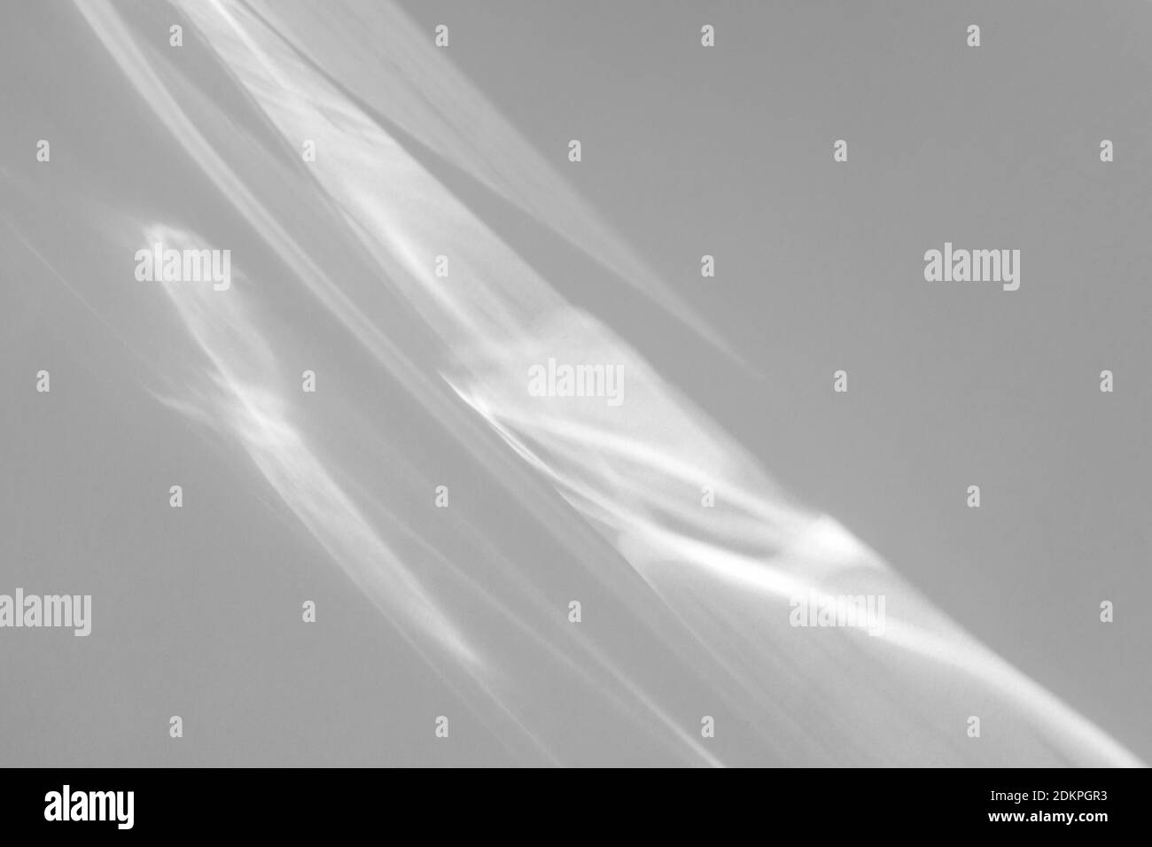 effet caustique ombre et lumière sur un mur blanc Banque D'Images